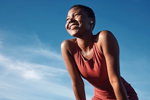 Lady smiles outdoors