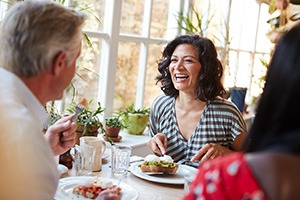 People converse over brunch