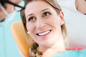 Smiling woman in dental chair