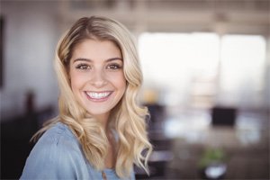 closeup of woman smiling after cosmetic dentistry in Gainesville