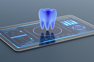 Electronic tablet with image of tooth floating above it