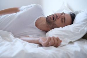 Man sleeping with his mouth open