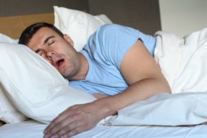 Snoring man with sleep apnea should see his Gainesville dentist