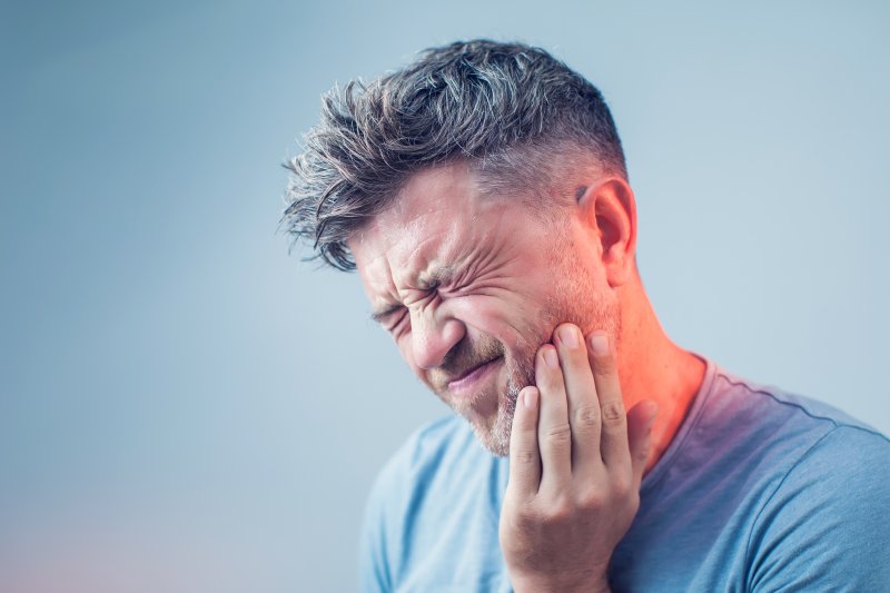 Man has tooth pain
